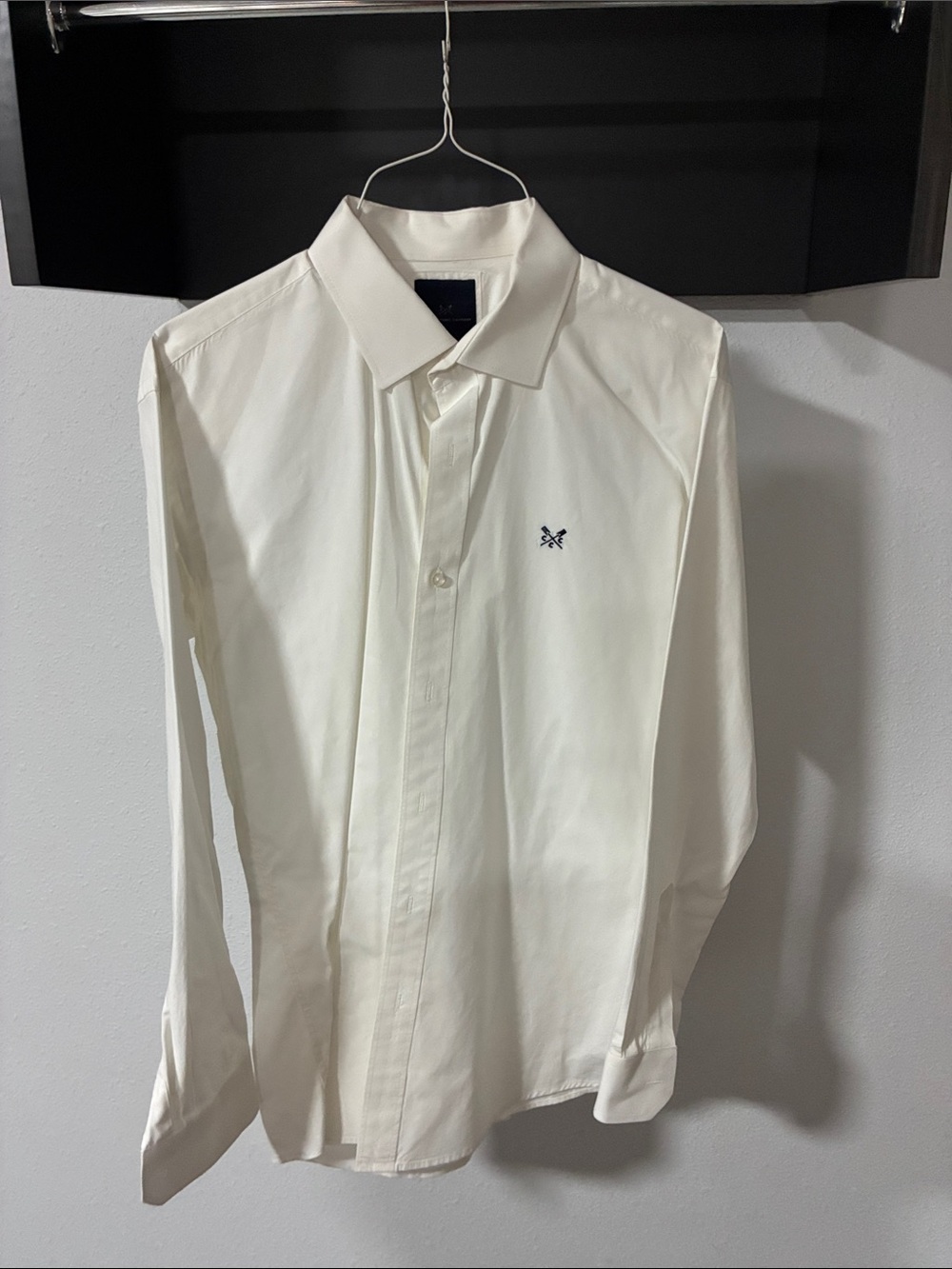 Classic Men's White Button-Down Shirt with Subtle Chest Logo
